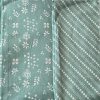 Unstitched 3-piece Lawn Suit with White Floral and Geometric Print