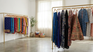 A rail of colourful pre-loved South Asian and modest outfits