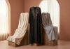 Preloved abayas in different styles on display