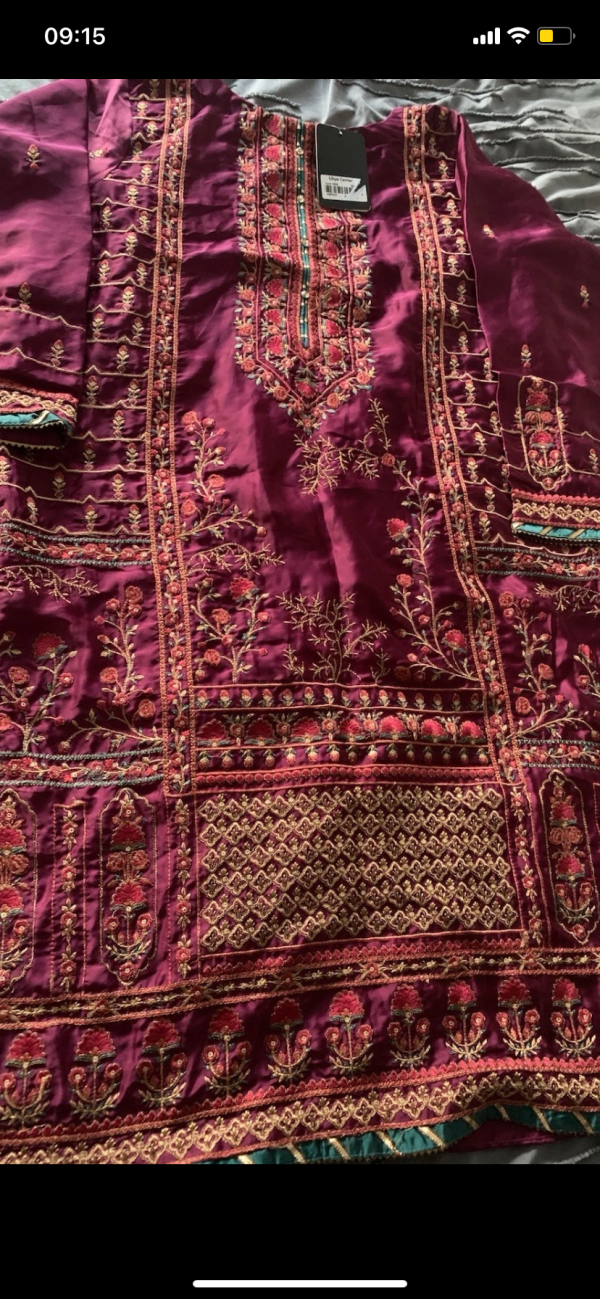 Purple embroidered kurta with teal trim