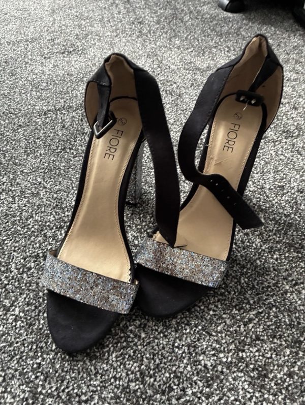 Black heeled sandals with glitter heels detail