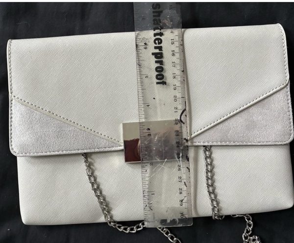 Off White clutch bag with silver accents and chain strap