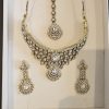 Stone adorned Kundan Maang Tikka and Earrings Set