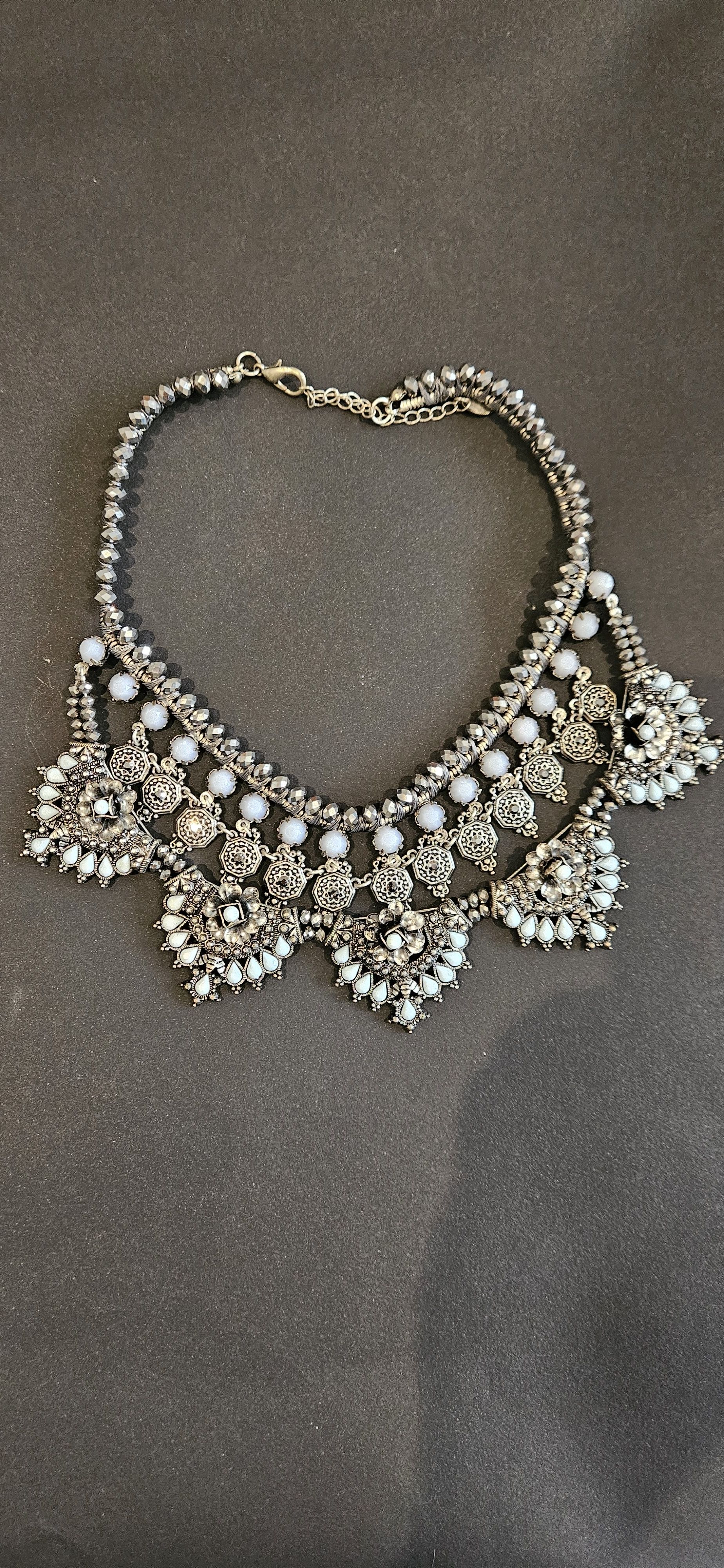 Silver Choker Necklace with Light Blue Pearls and Intricate Detailing