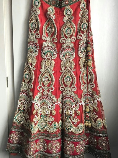 Rust Orange Bridal Lehenga with Gold, Red & Green Embroidery - Image 2