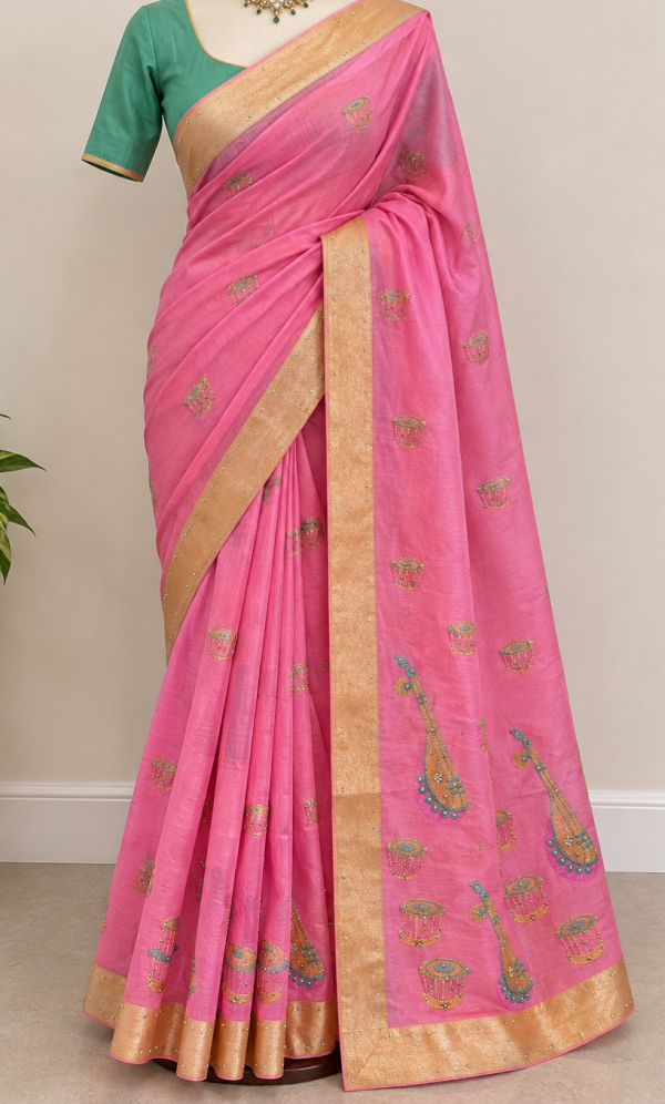Beautiful Pink & Gold Saree with tabla & veena motifs