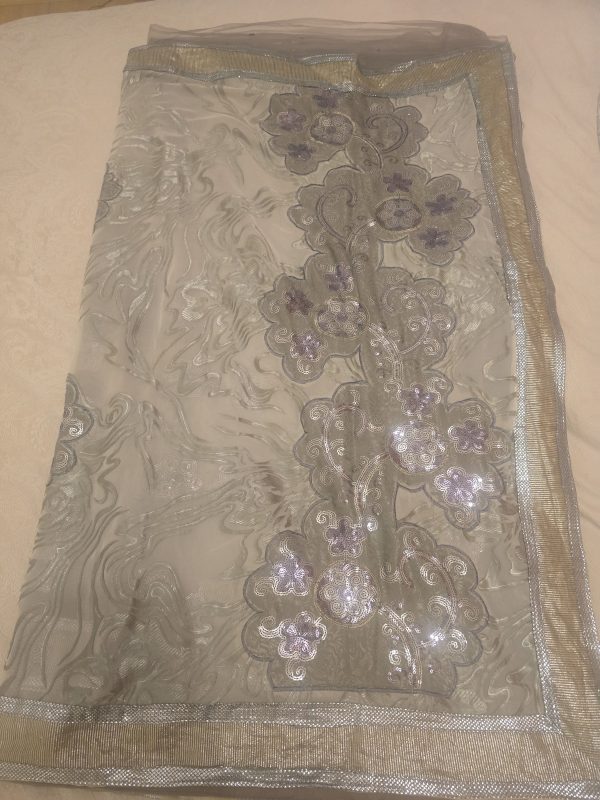 Stunning white and grey half net saree