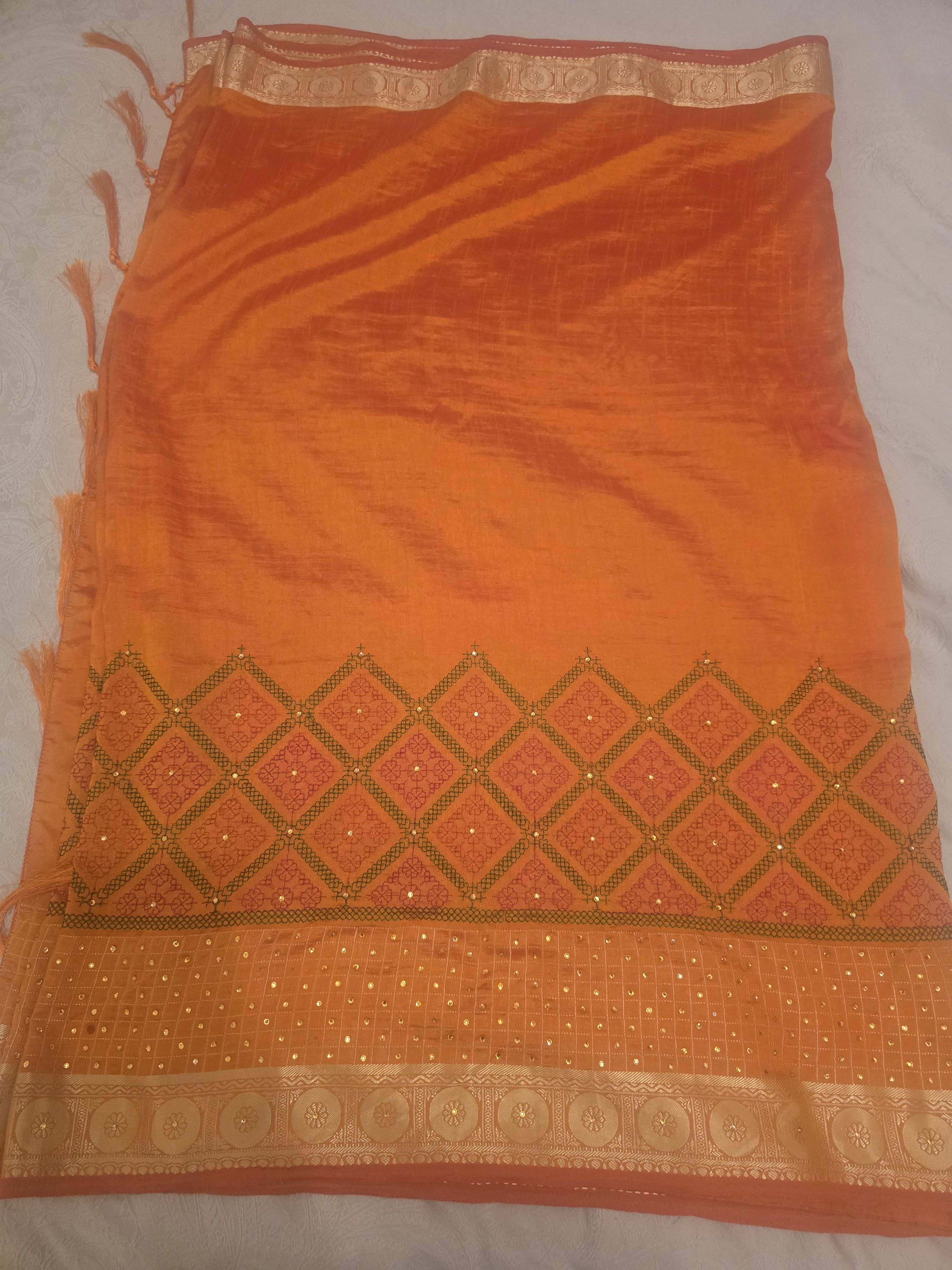 Beautiful vibrant orange saree with an elegant traditional look - Image 2
