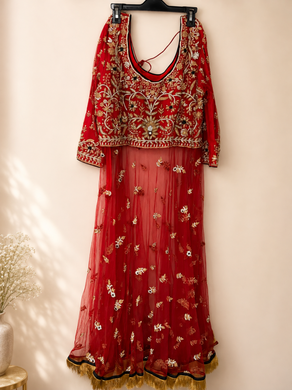 Red Bridal Lehenga with Gold Embroidery and Tassels