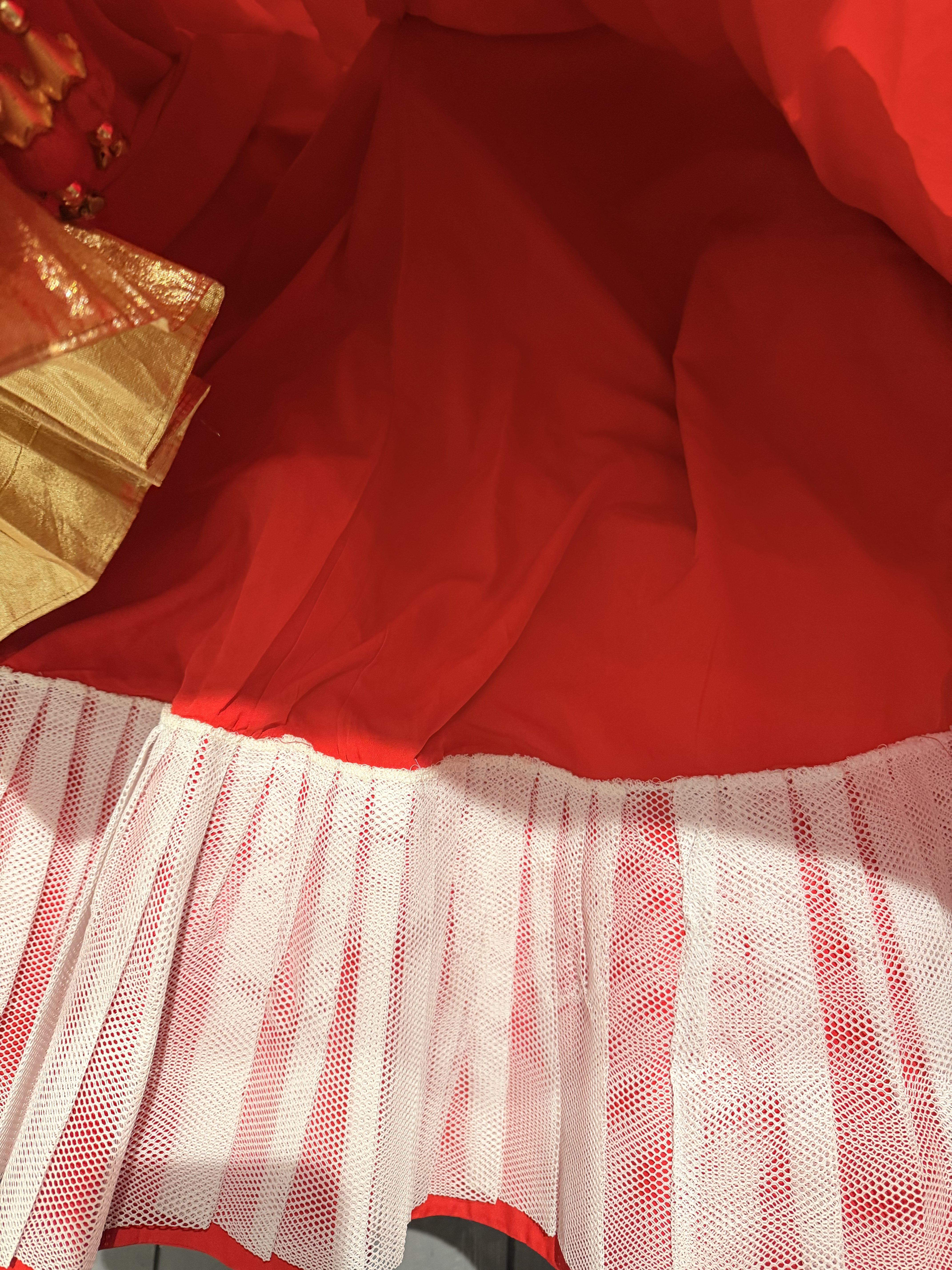 Red Bridal Lehenga with Gold Embroidery and Tassels - Image 4