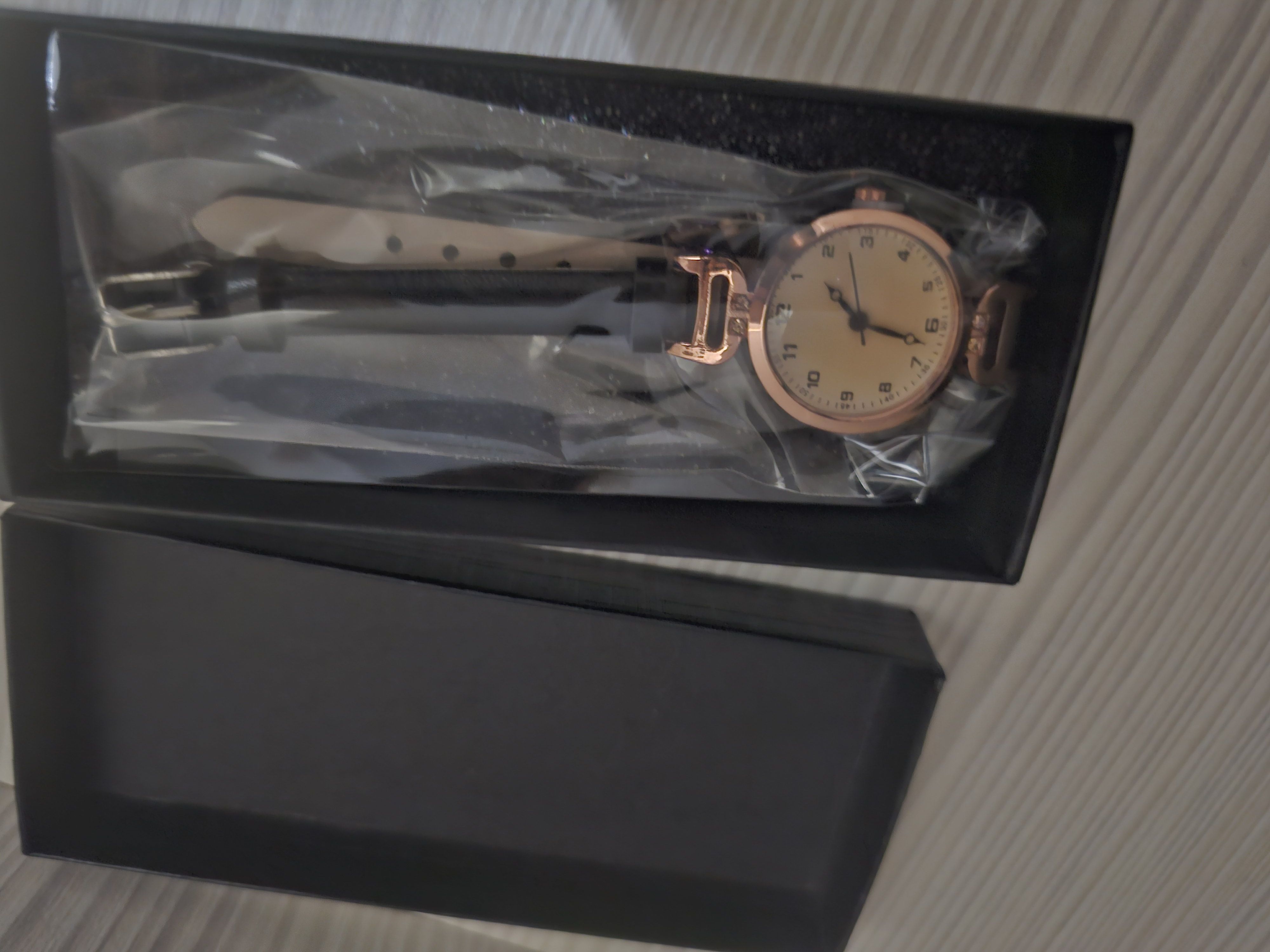 Women's Rose Gold Tone Watch with Black Strap