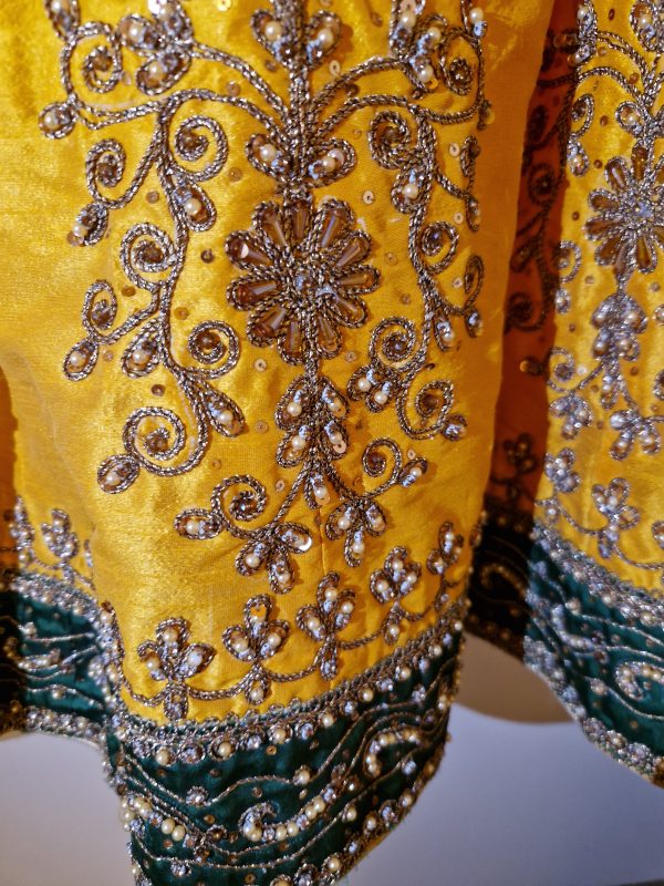 Yellow Anarkali dress with Green Border and Gold, silver and bead Embellishment