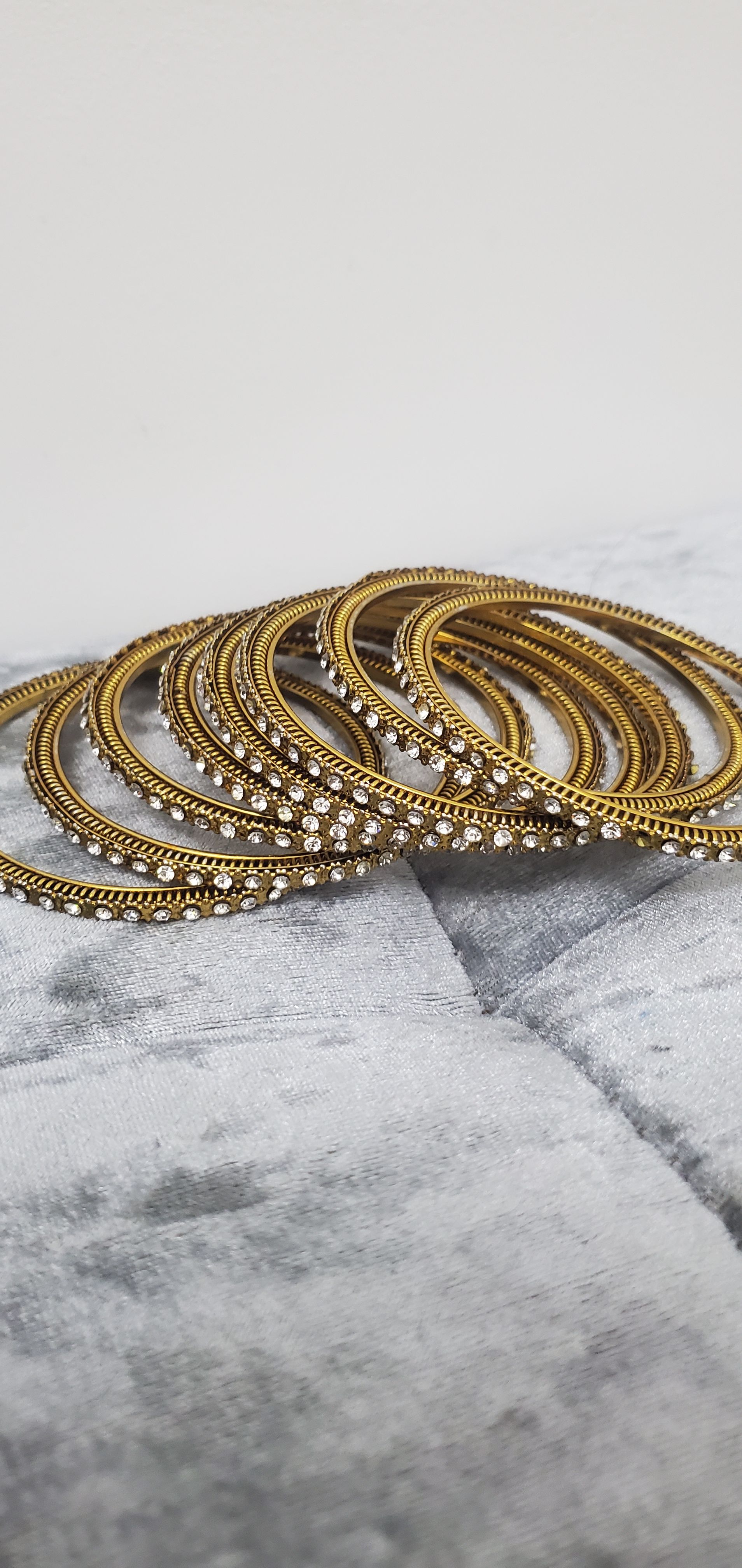 Golden Bangles with White Stones Set of 8