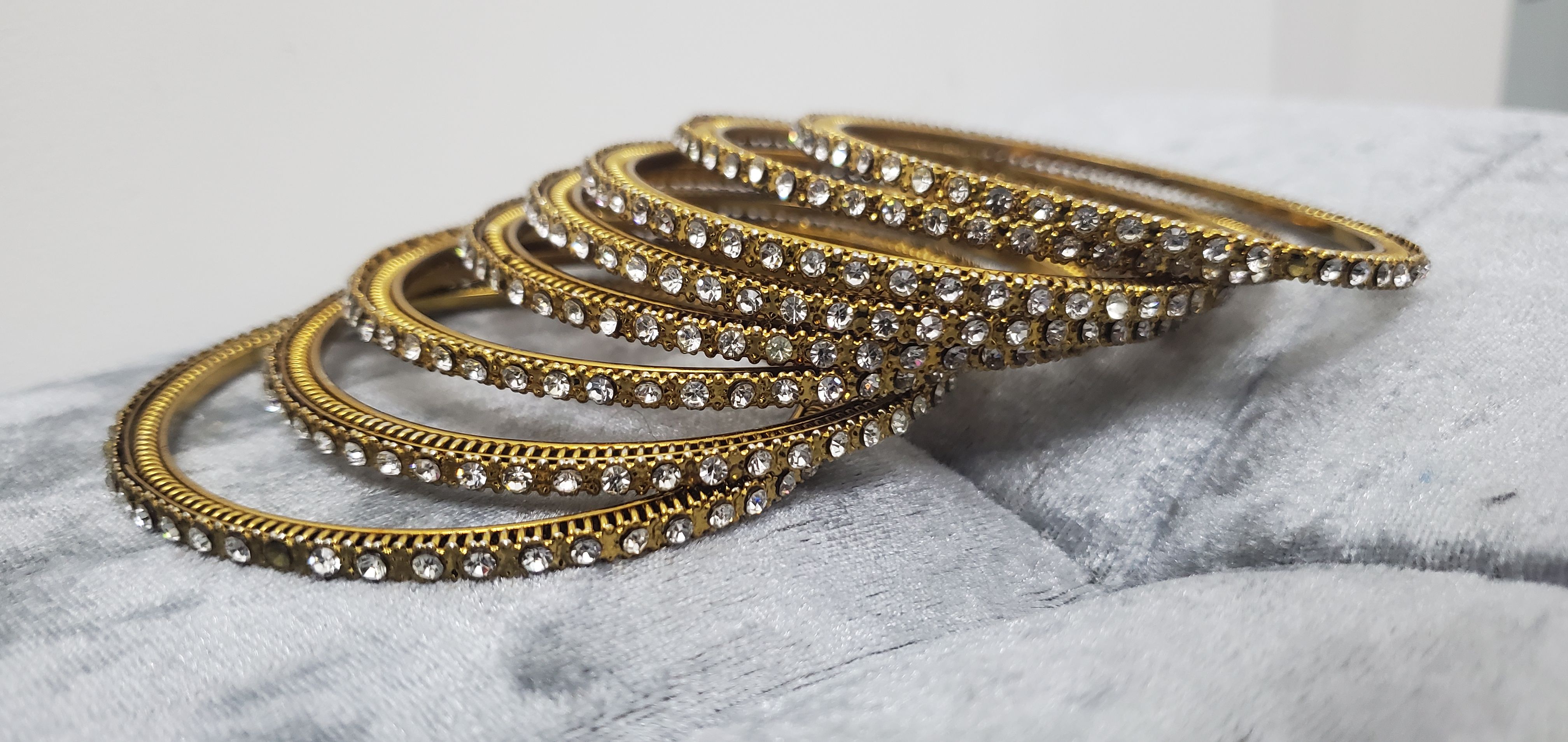 Golden Bangles with White Stones Set of 8 - Image 2