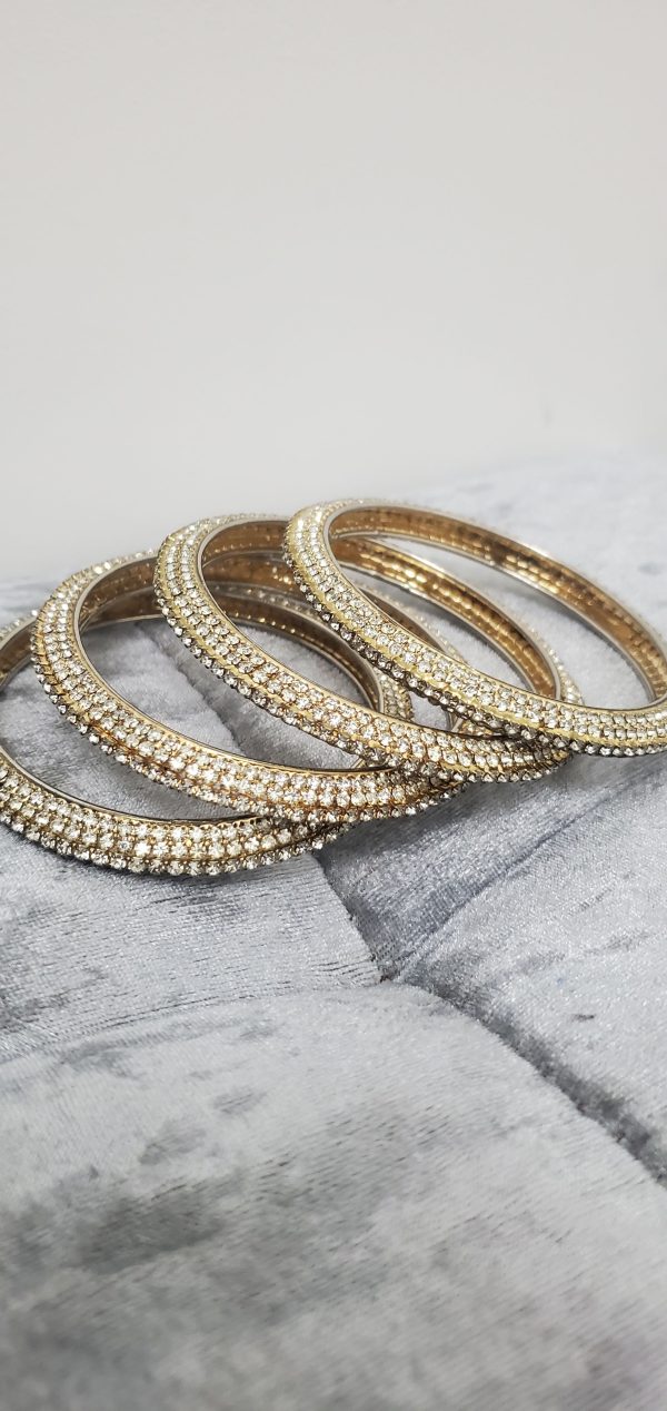 Set of 4 Gold Bangles with White Stones